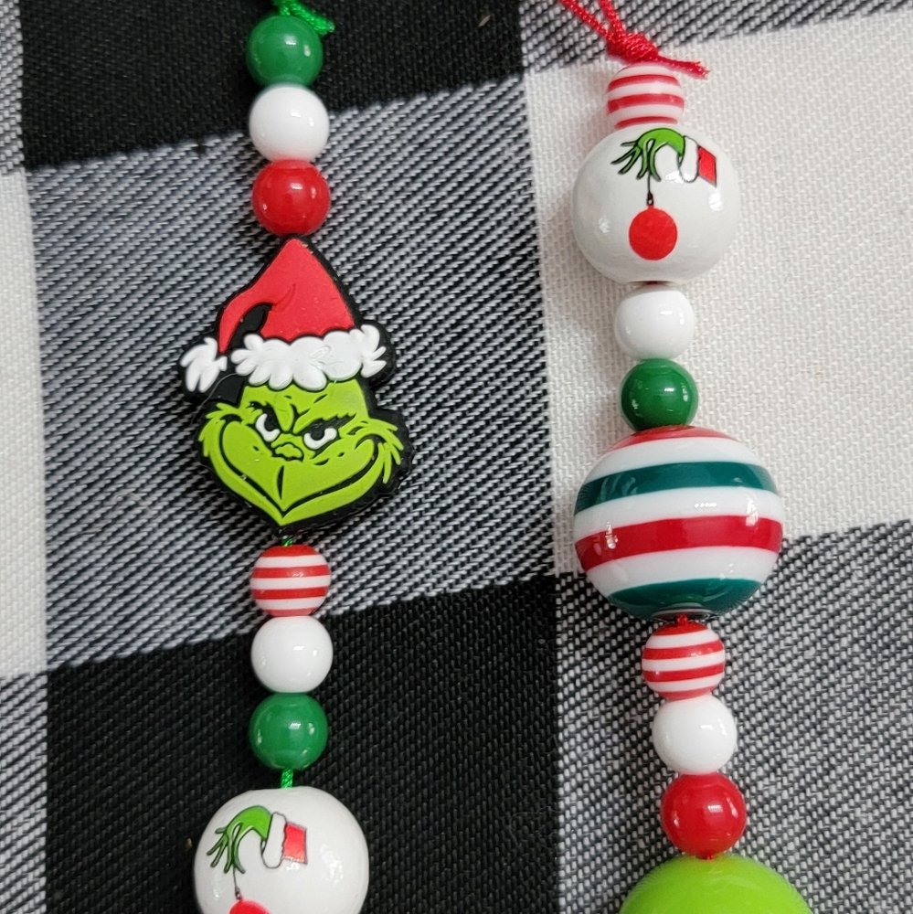 33.  2 GRINCH Christmas Ornaments